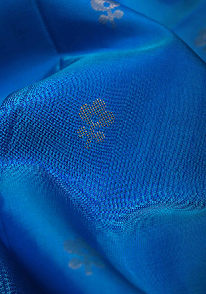 Cerulean Blue Kanjivaram Soft Silk Saree with Floral Zari Buttas and Contrast Zari Border | SILK MARK CERTIFIED | SHOBITAM