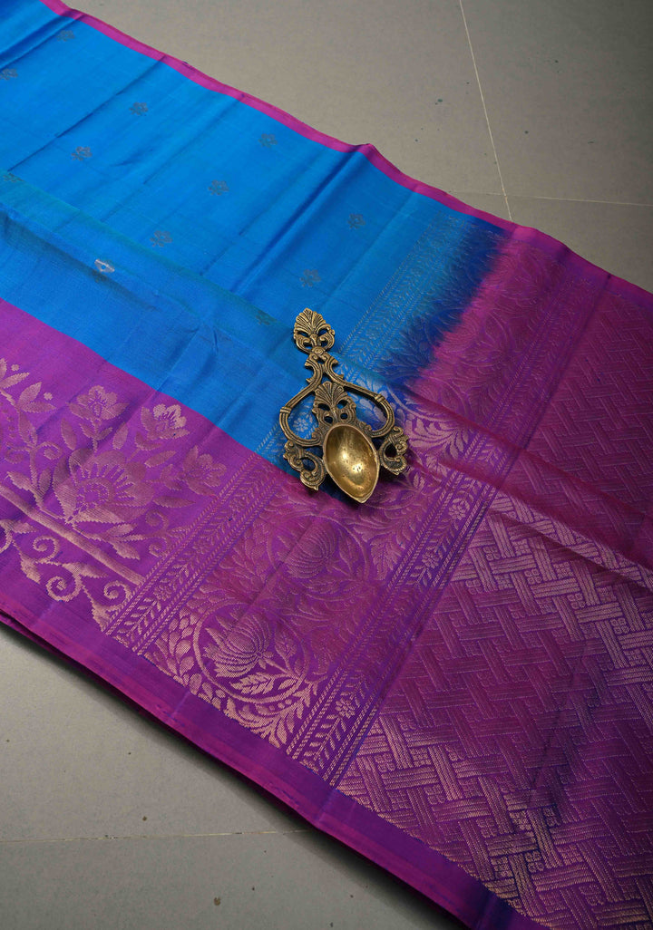 Cerulean Blue Kanjivaram Soft Silk Saree with Floral Zari Buttas and Contrast Zari Border | SILK MARK CERTIFIED | SHOBITAM