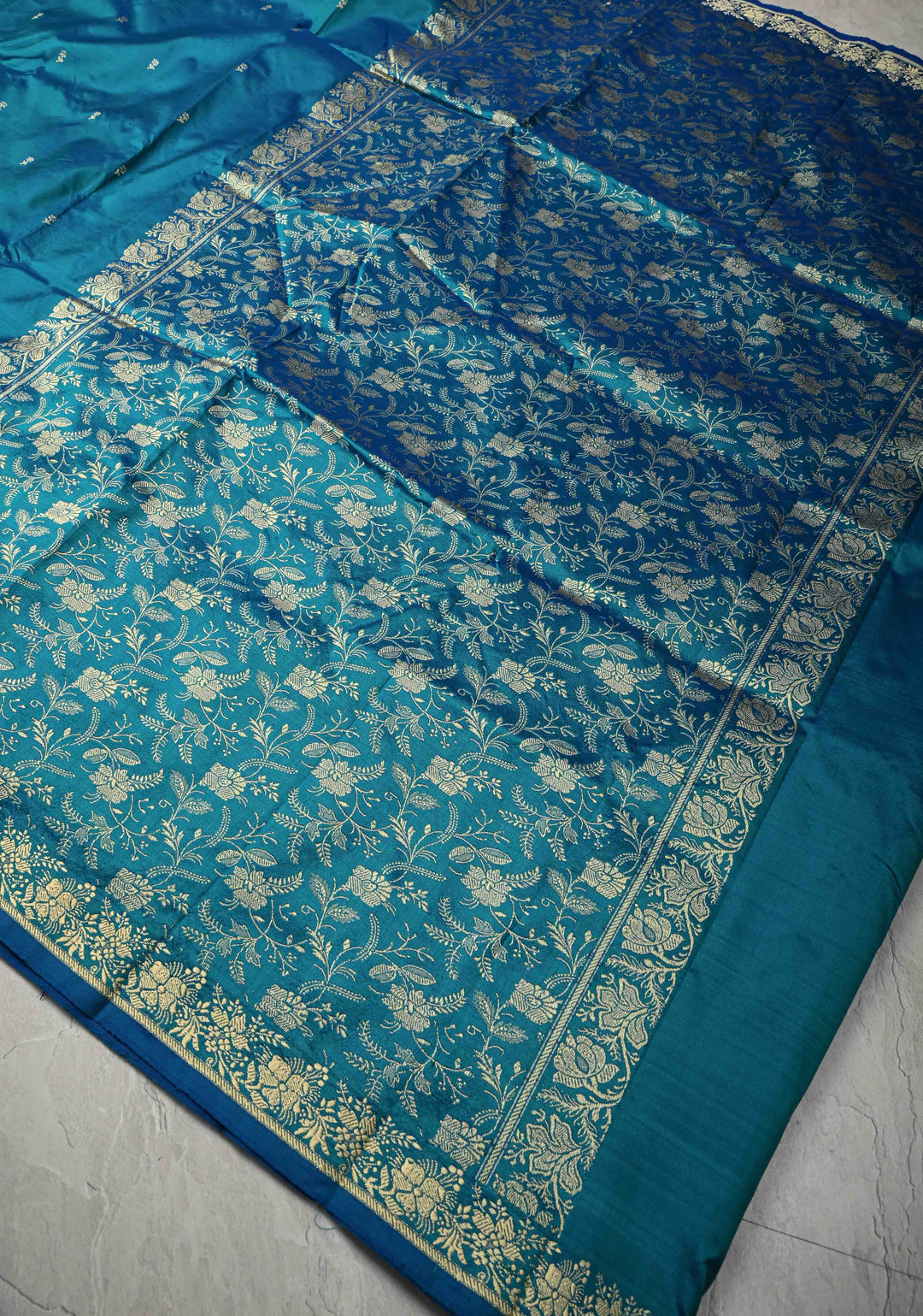 Peacock Blue Pure Banarasi Lightweight Katan Silk Saree with Floral Butti and Minimal Zari Border | SILK MARK CERTIFIED