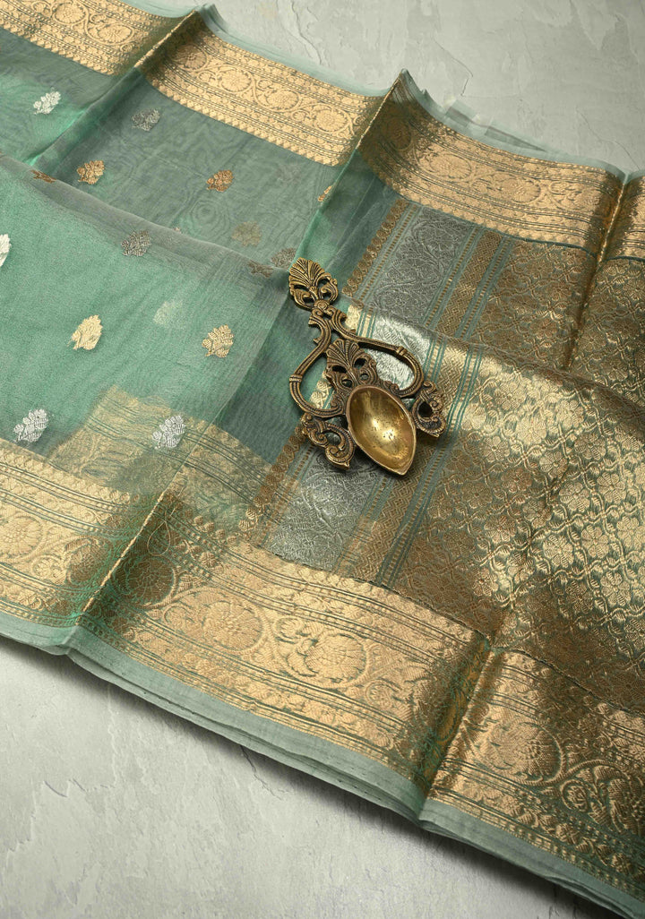 Sage Green Pure Banarasi Organza Tissue Silk Saree with Sona Rupa Buttas and Zari Border | SILK MARK CERTIFIED | SHOBITAM