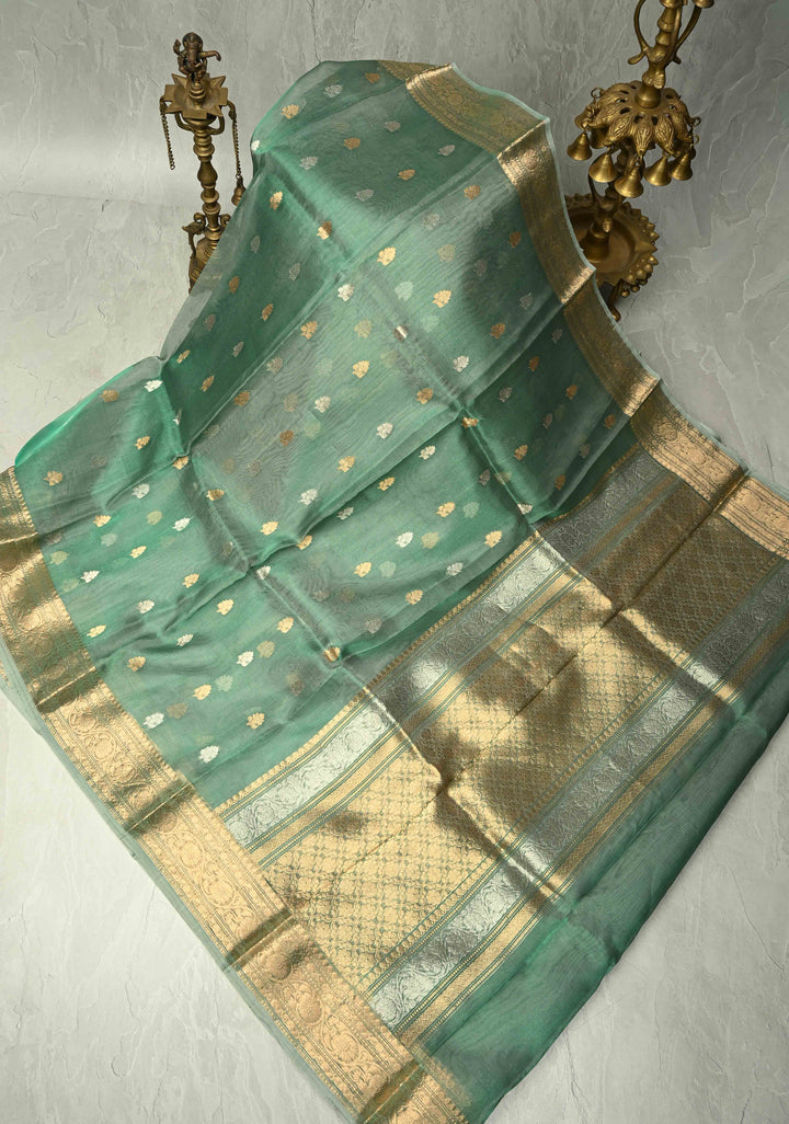 Sage Green Pure Banarasi Organza Tissue Silk Saree with Sona Rupa Buttas and Zari Border | SILK MARK CERTIFIED | SHOBITAM