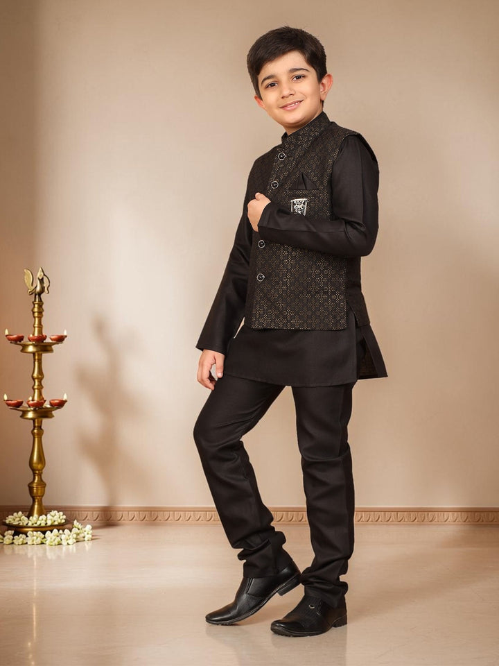 Boys Cotton Silk Solid Kurta Pyjama Set With Jacquard Geometric Floral Motifs Waistcoat - Black | SHOBITAM