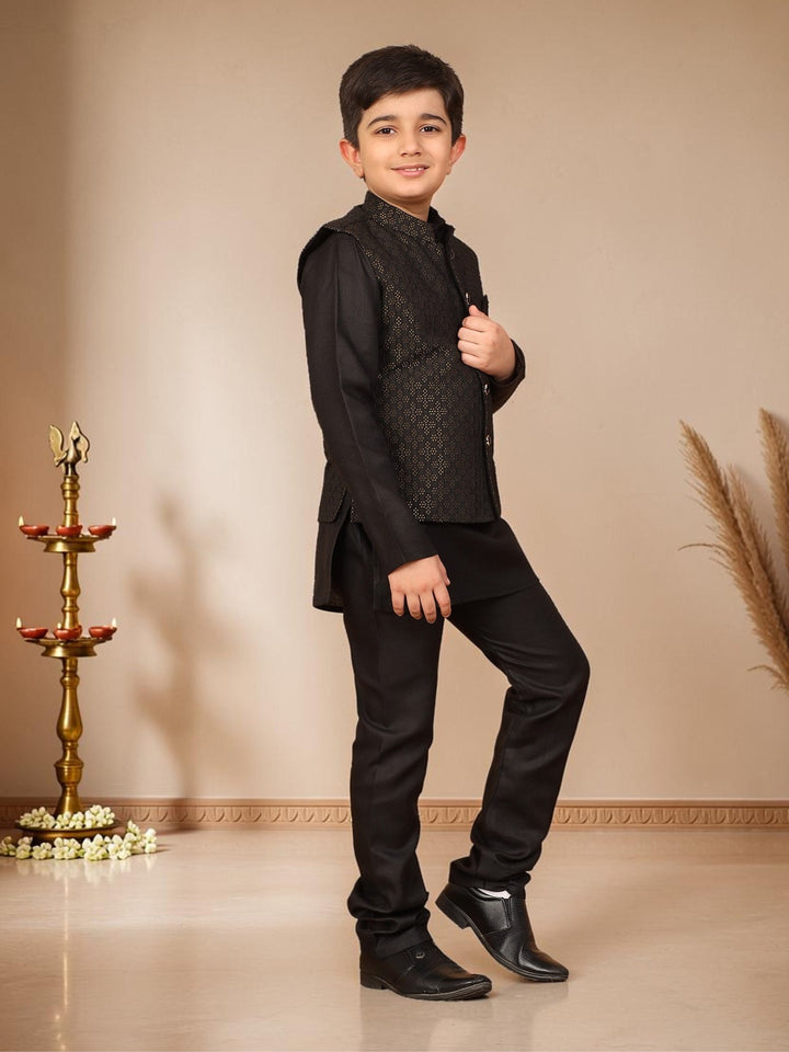 Boys Cotton Silk Solid Kurta Pyjama Set With Jacquard Geometric Floral Motifs Waistcoat - Black | SHOBITAM