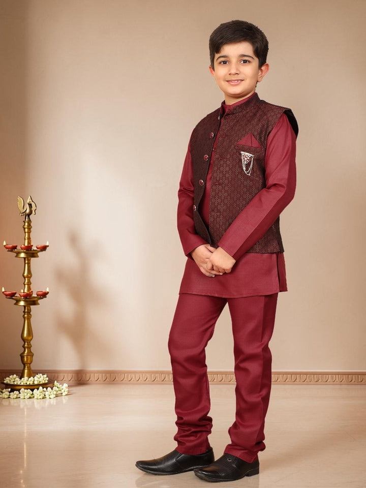 Boys Cotton Silk Solid Kurta Pyjama Set With Jacquard Geometric Floral Motifs Waistcoat - Maroon | SHOBITAM