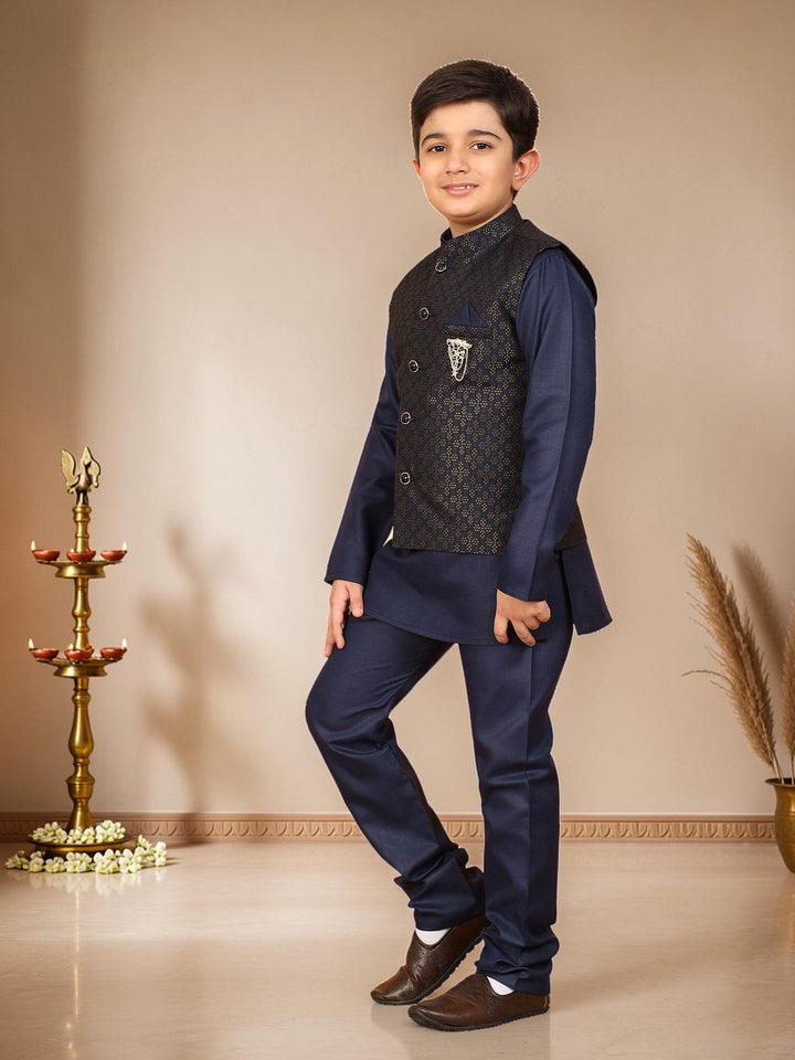 Boys Cotton Silk Solid Kurta Pyjama Set With Jacquard Geometric Floral Motifs Waistcoat - Navy Blue | SHOBITAM