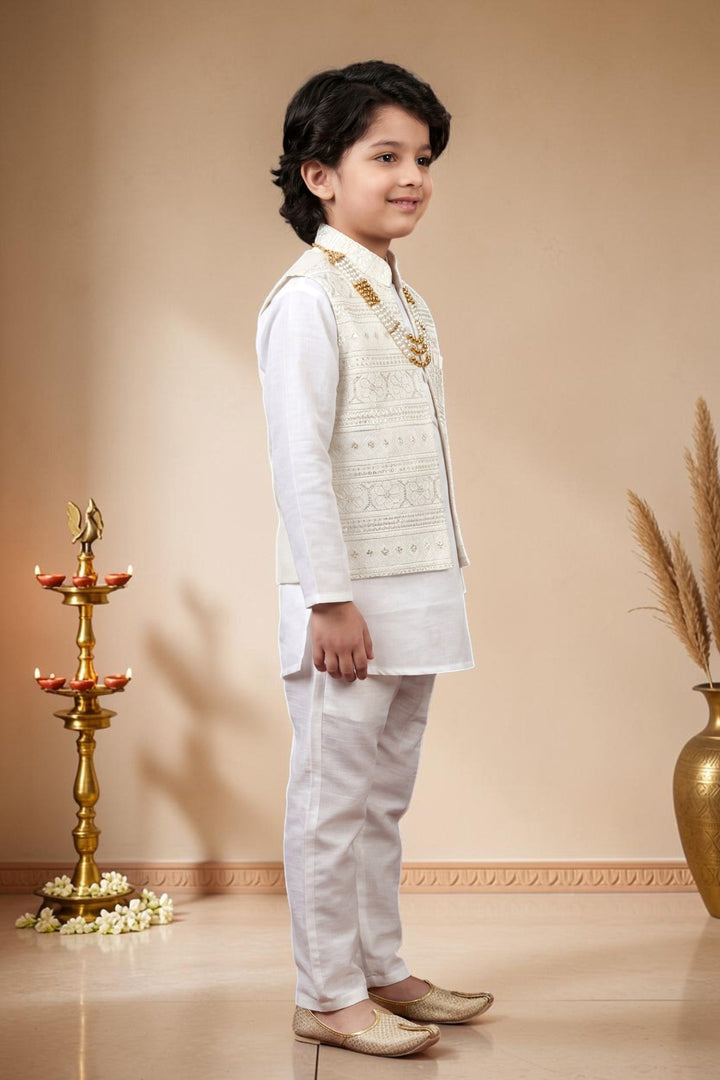 Boys Satin Kurta Trouser Set With Floral Embroidered Sequined Waistcoat & Necklace - White | SHOBITAM