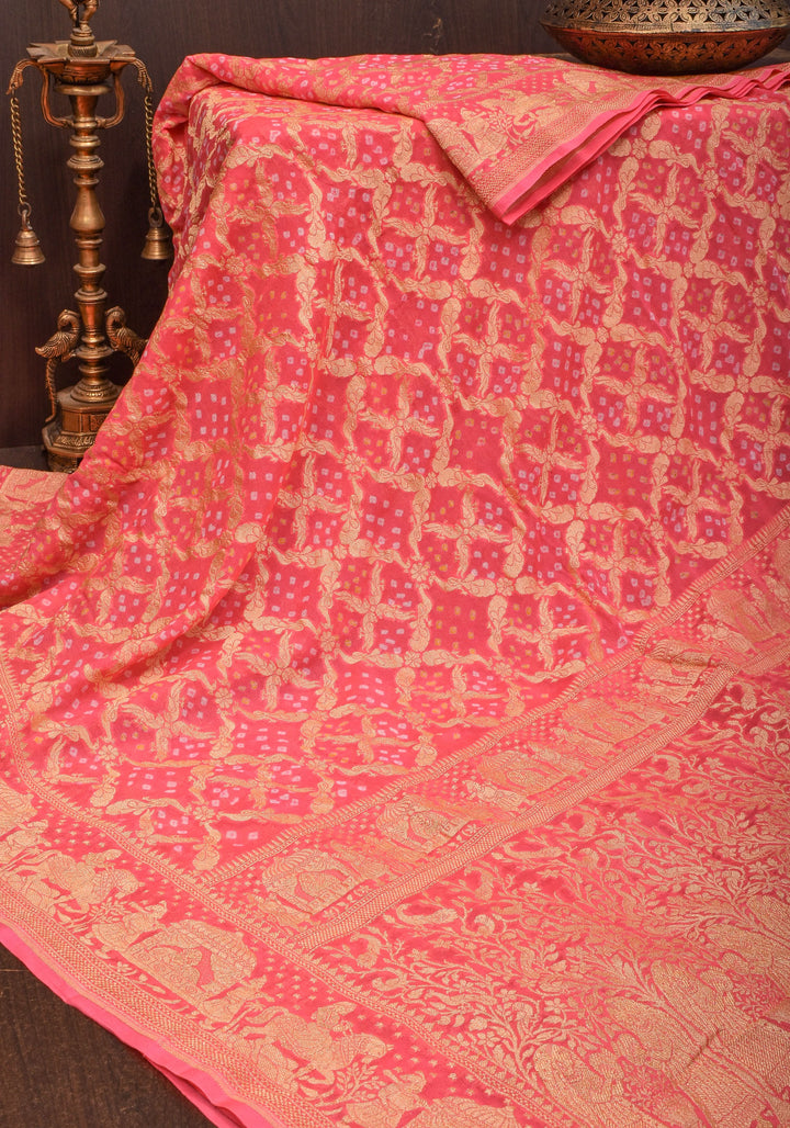 Coral Pink Color Authentic Bandhej on Shikaargah Peacock Jaal Pure Silk Georgette Banarasi Saree with Royal Procession | SILK MARK CERTIFIED