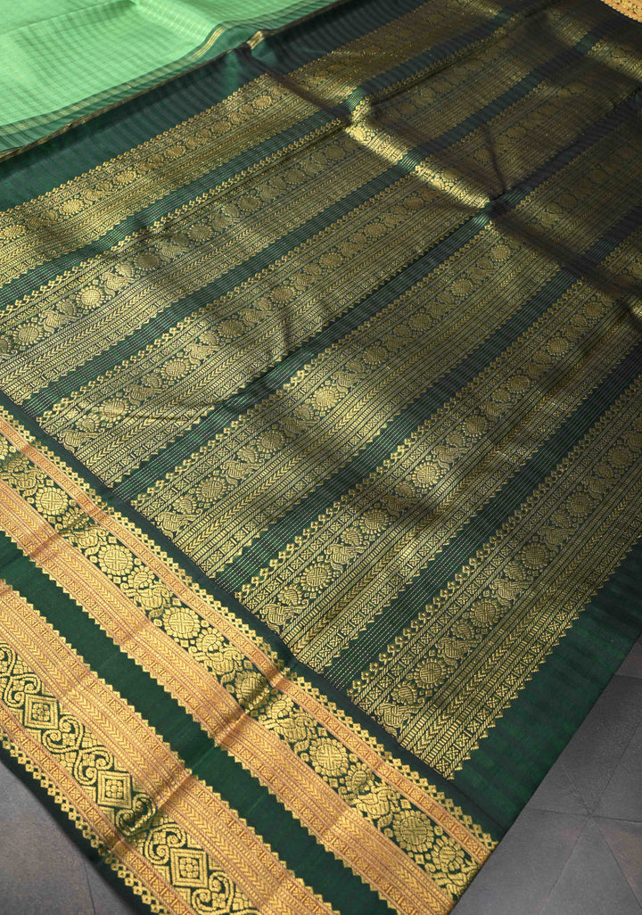 Pure Zari Korvai Green vertical Zari Stripes Kanjivaram Silk Saree with contrast zari border | SILK MARK CERTIFIED