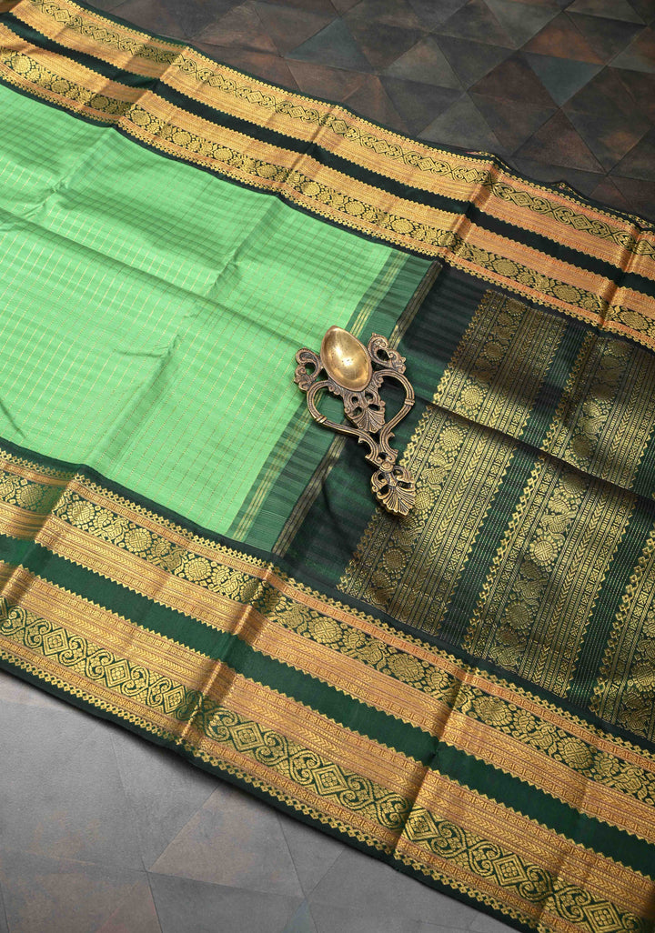 Pure Zari Korvai Green vertical Zari Stripes Kanjivaram Silk Saree with contrast zari border | SILK MARK CERTIFIED