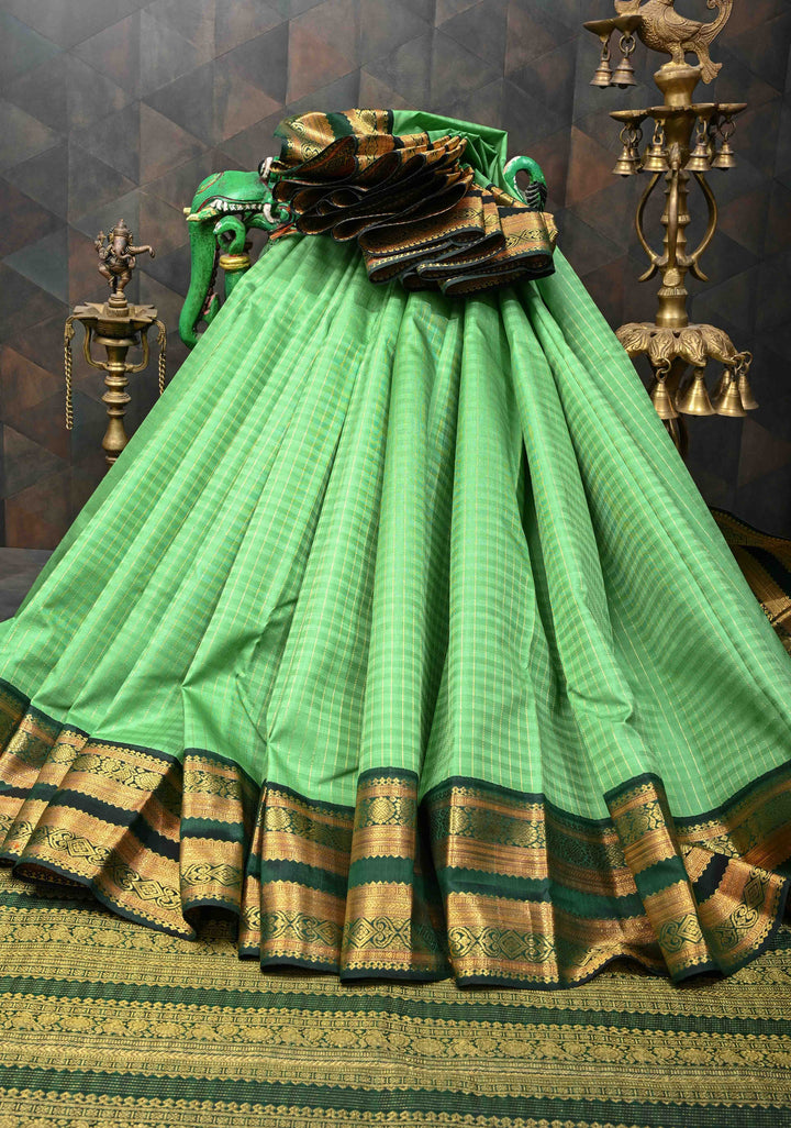 Pure Zari Korvai Green vertical Zari Stripes Kanjivaram Silk Saree with contrast zari border | SILK MARK CERTIFIED