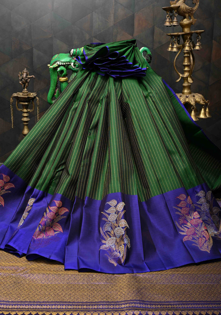 Bottle Green Pure Kanjivaram Silk Saree with Vertical Zari Stripes and Meenakari Distinct Floral Buttas on Contrast Border | SILK MARK CERTIFIED