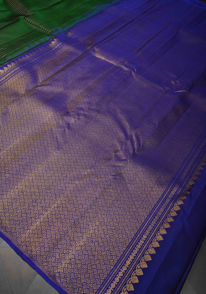 Bottle Green Pure Kanjivaram Silk Saree with Vertical Zari Stripes and Meenakari Distinct Floral Buttas on Contrast Border | SILK MARK CERTIFIED