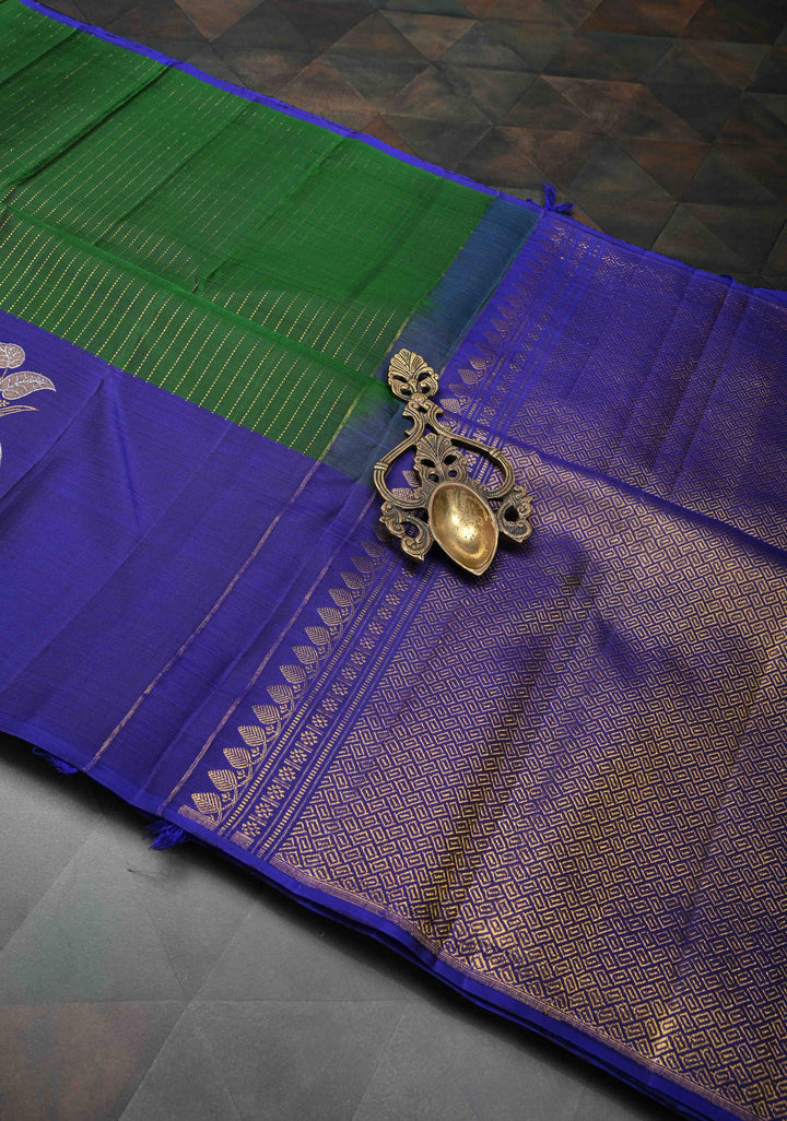 Bottle Green Pure Kanjivaram Silk Saree with Vertical Zari Stripes and Meenakari Distinct Floral Buttas on Contrast Border | SILK MARK CERTIFIED