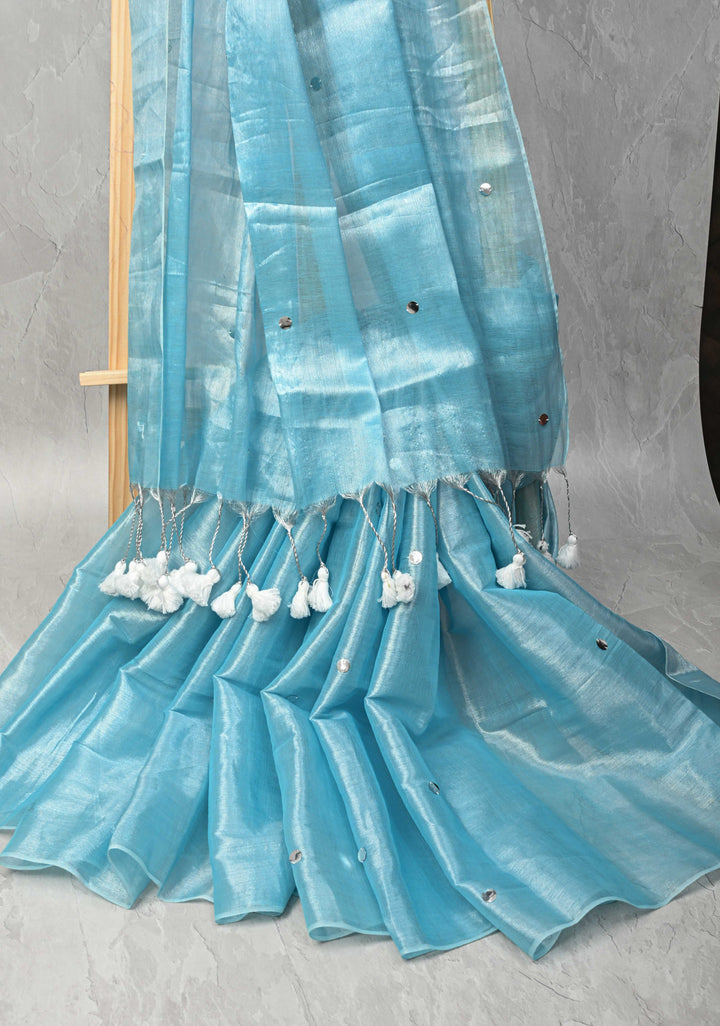 Light Turquoise Organza saree With Tikki work and Long Tassels