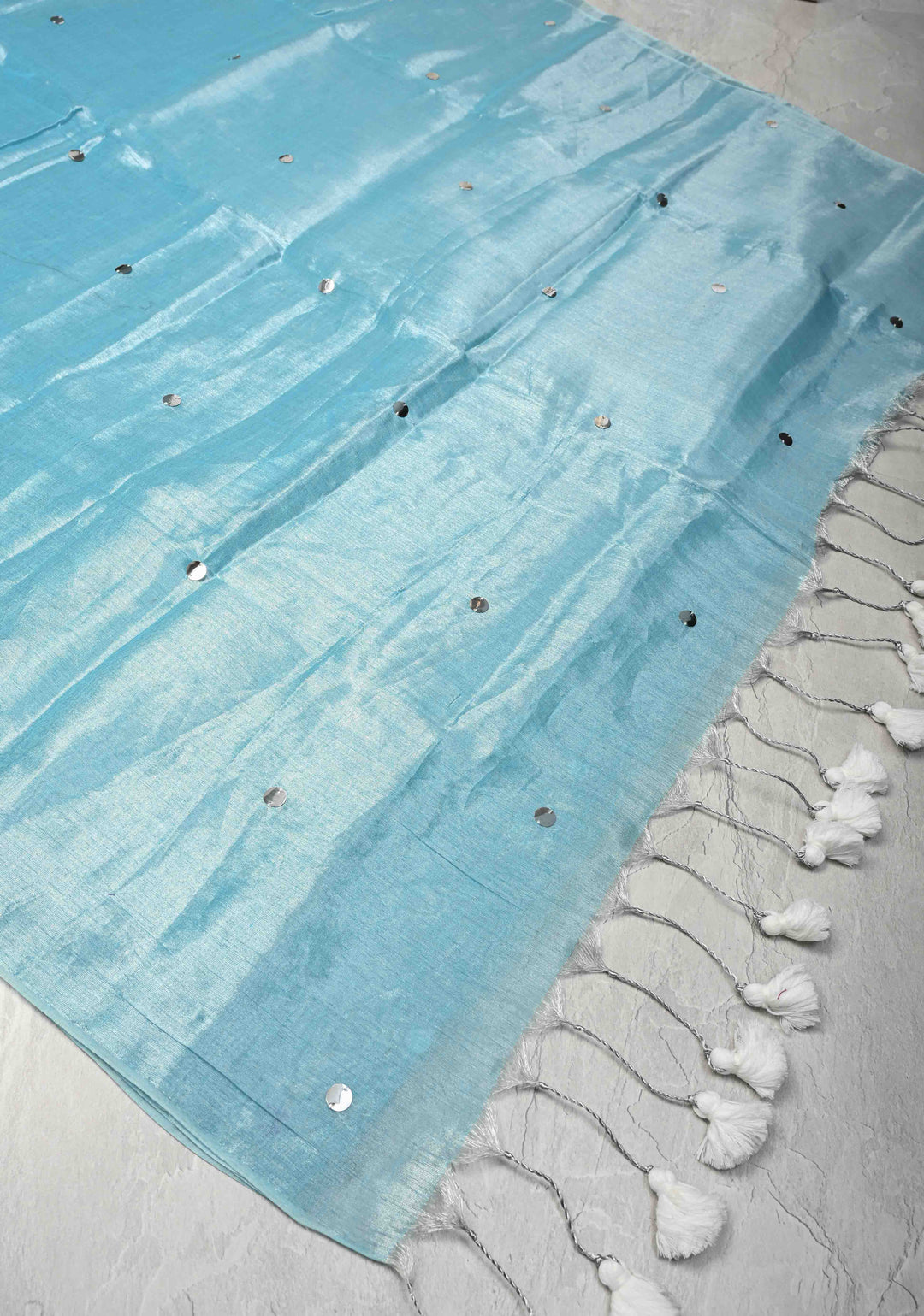 Light Turquoise Organza saree With Tikki work and Long Tassels