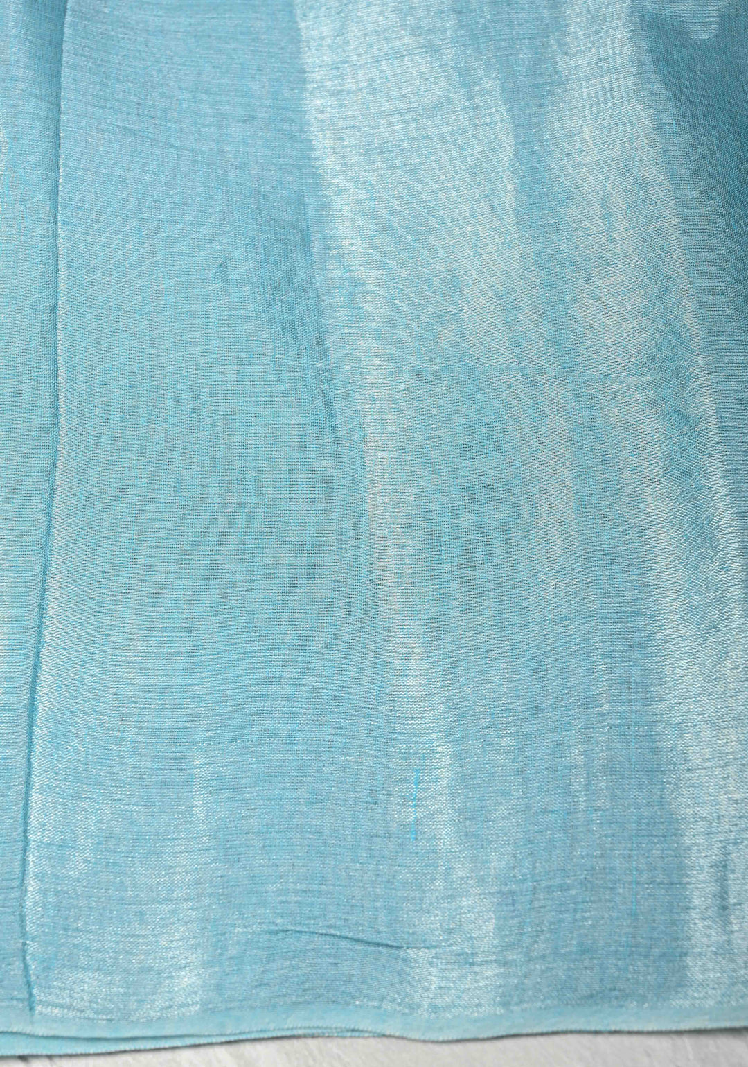 Light Turquoise Organza saree With Tikki work and Long Tassels
