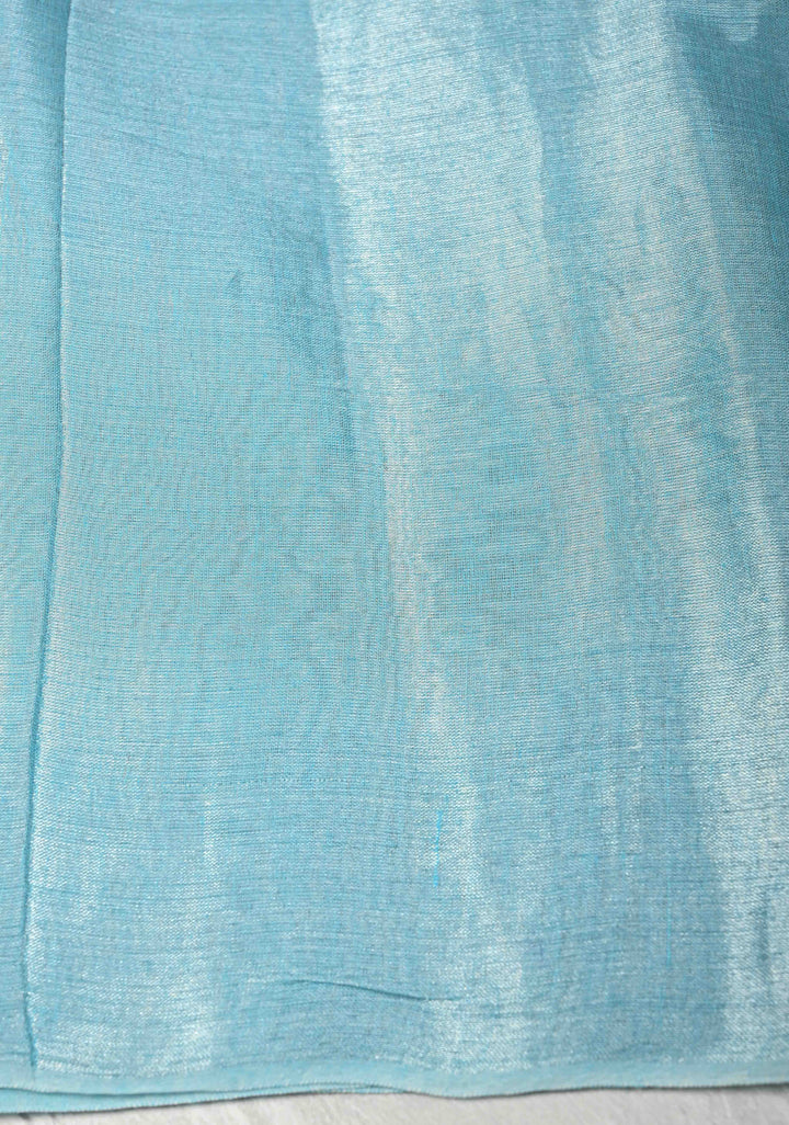 Light Turquoise Organza saree With Tikki work and Long Tassels