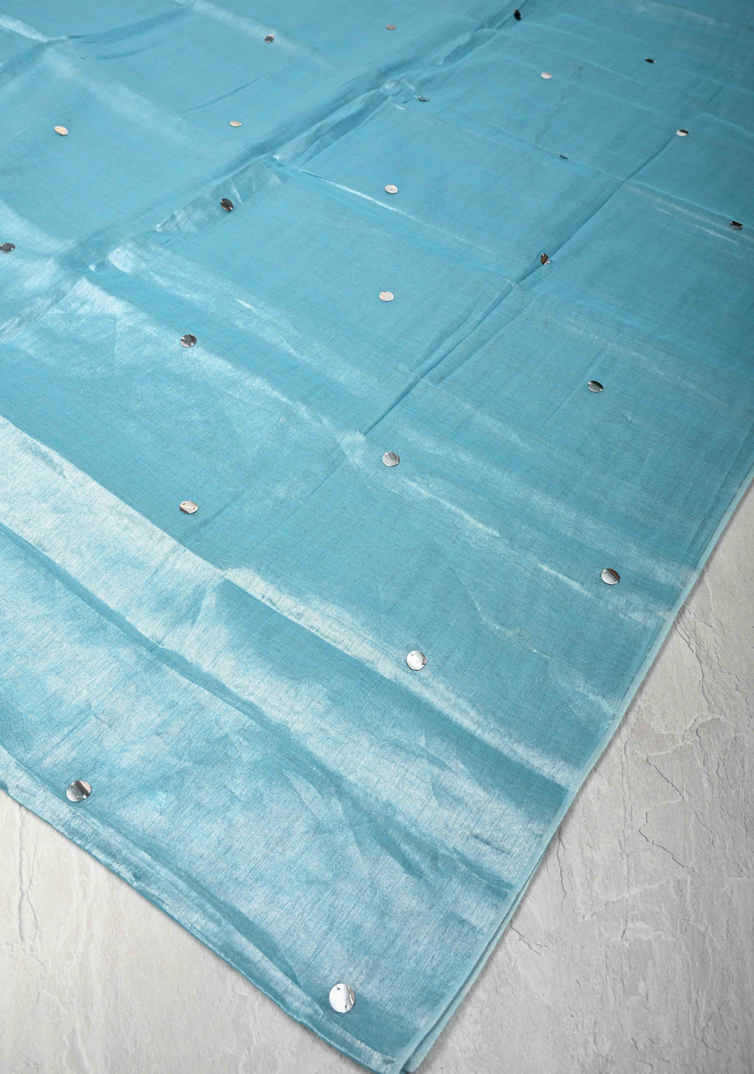 Light Turquoise Organza saree With Tikki work and Long Tassels