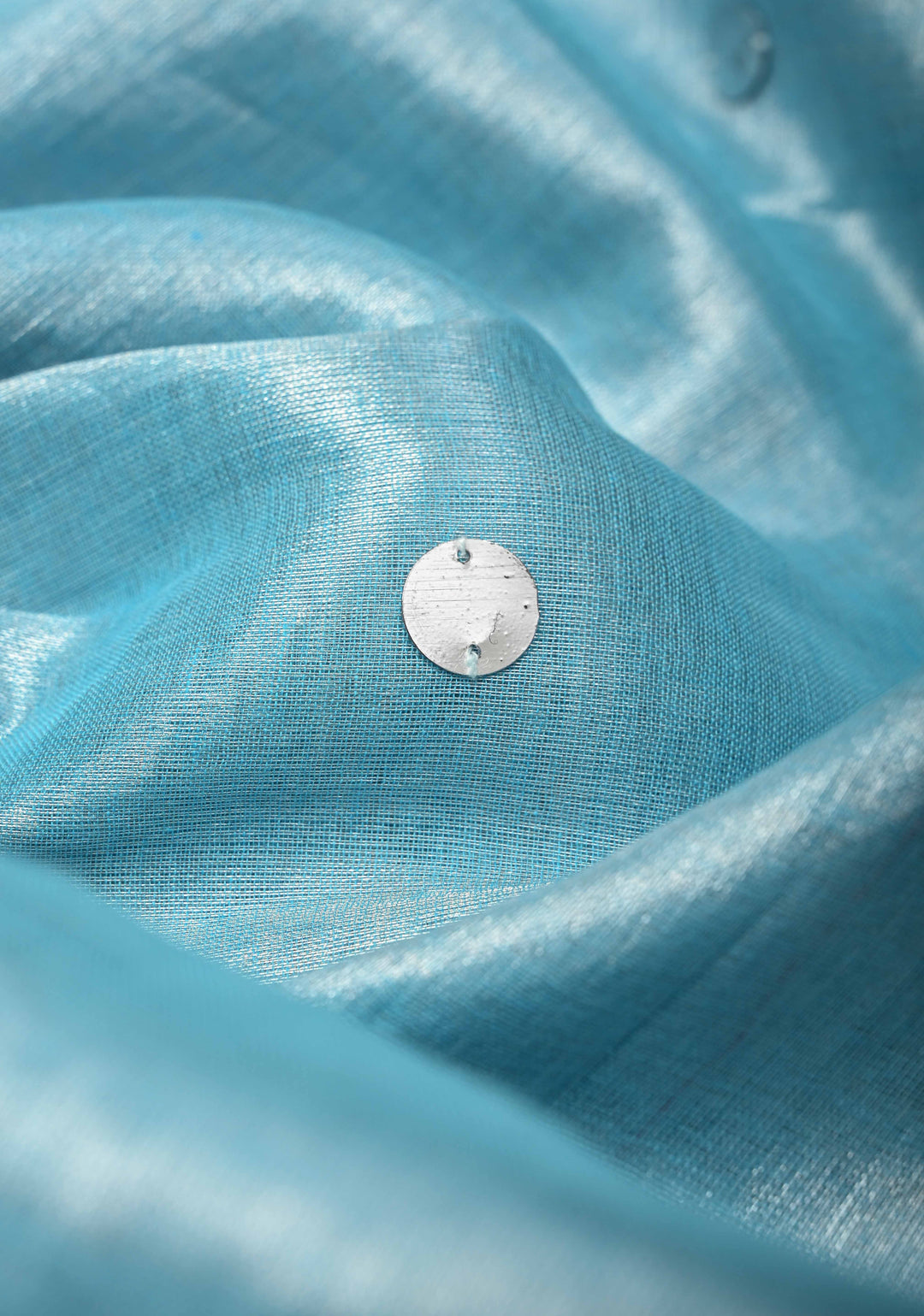 Light Turquoise Organza saree With Tikki work and Long Tassels
