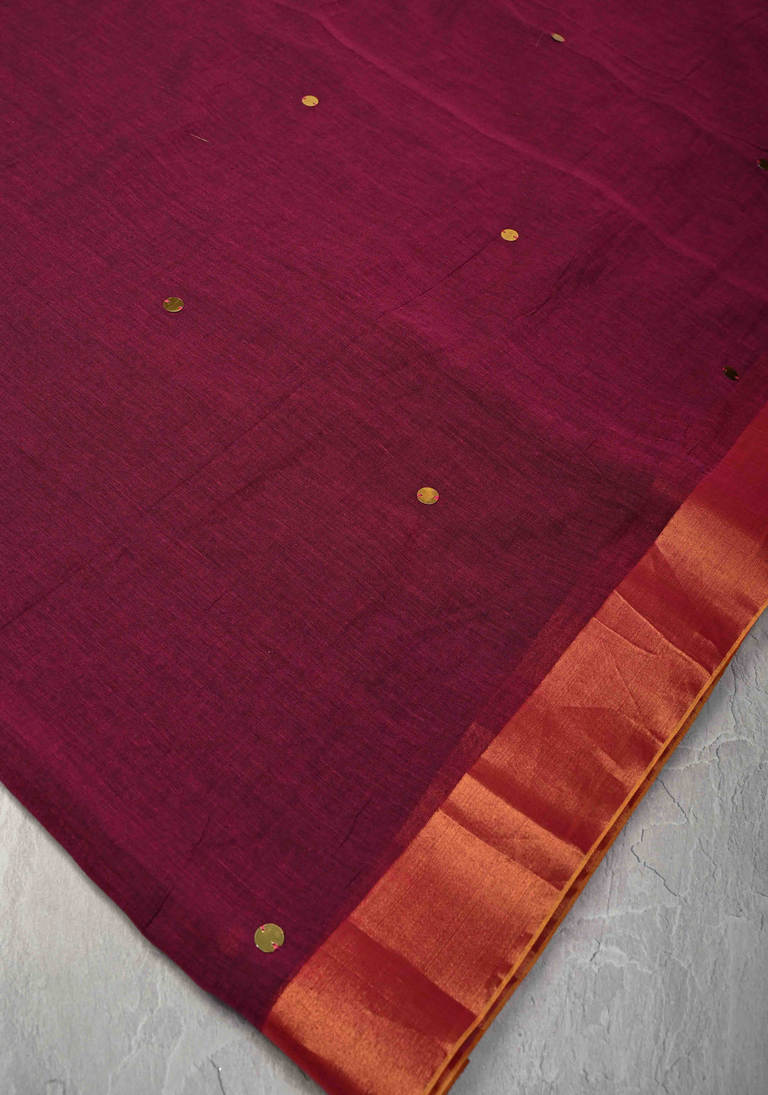 Plum Bengal Mul Cotton saree in With Tikki work and Long Tassels