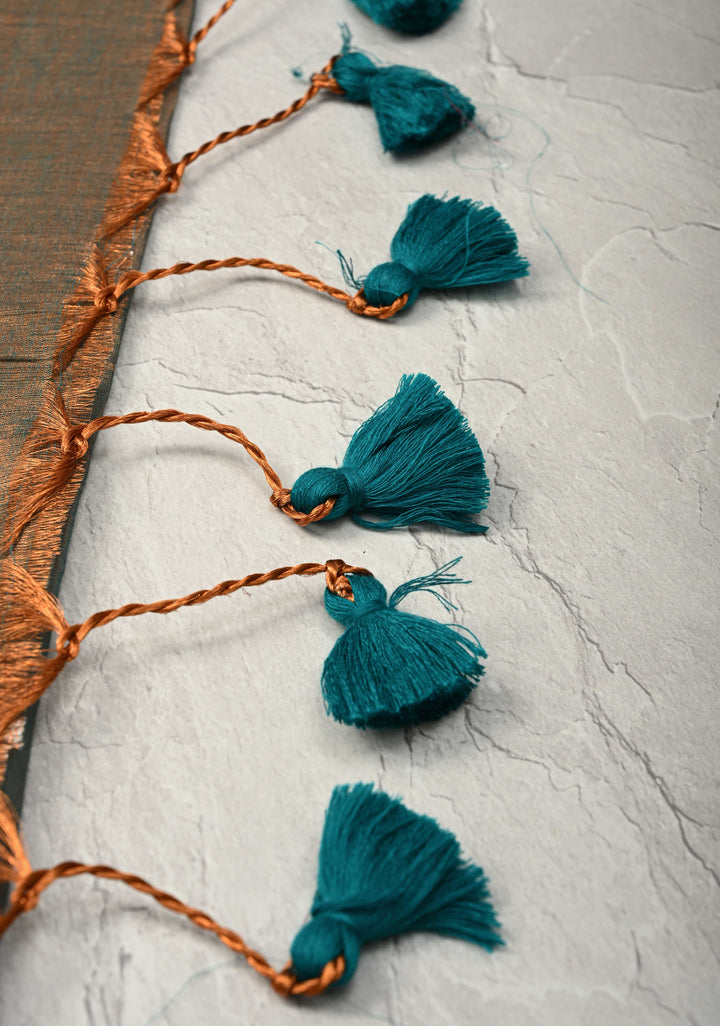 Patina Green Tissue by Tissue Saree with Tikki Work and Long Tassels