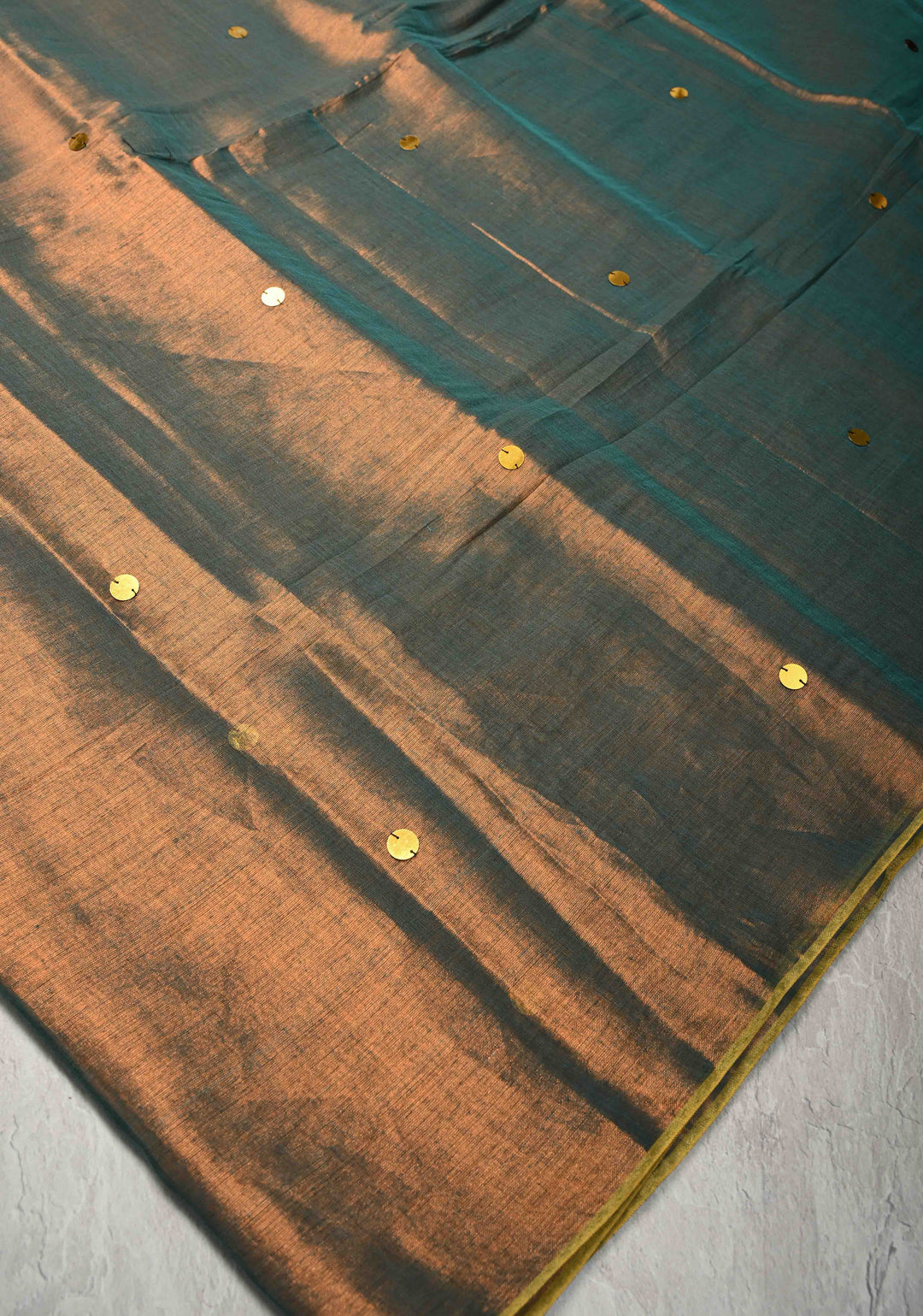 Patina Green Tissue by Tissue Saree with Tikki Work and Long Tassels