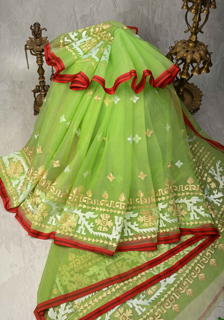 Fresh Green Mercedized Bengal cotton machine embroidered Butta and Border and long tassels