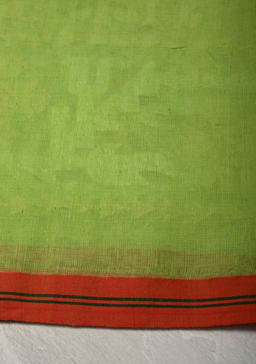Fresh Green Mercedized Bengal cotton machine embroidered Butta and Border and long tassels