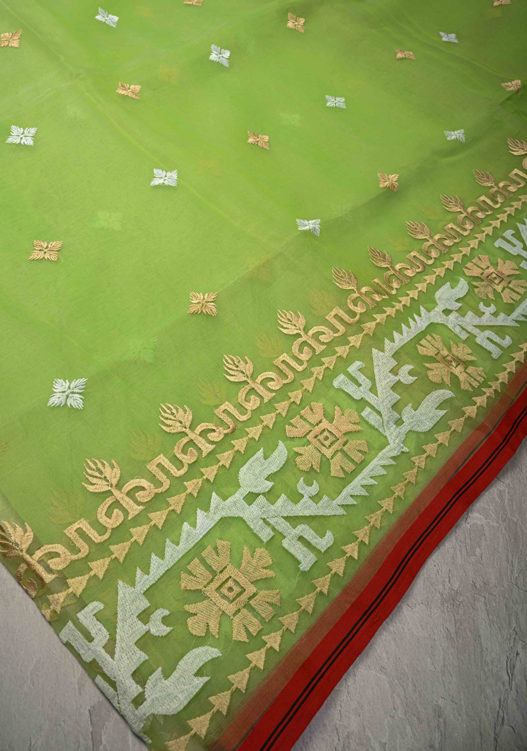 Fresh Green Mercedized Bengal cotton machine embroidered Butta and Border and long tassels