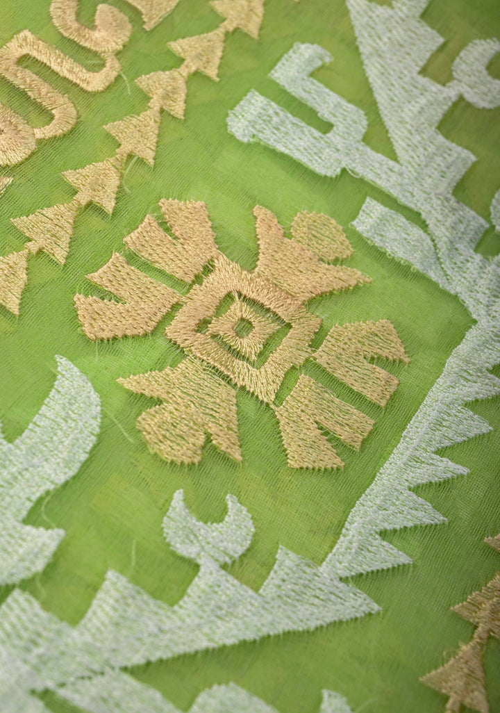 Fresh Green Mercedized Bengal cotton machine embroidered Butta and Border and long tassels