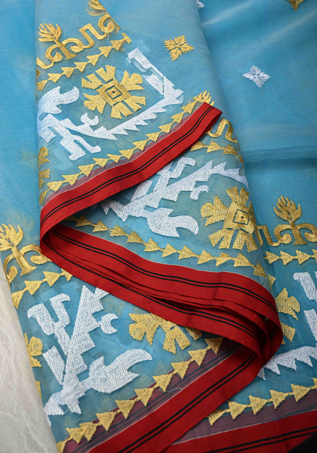 Sky Blue Mercedized Bengal cotton machine embroidered Butta and Border and long tassels