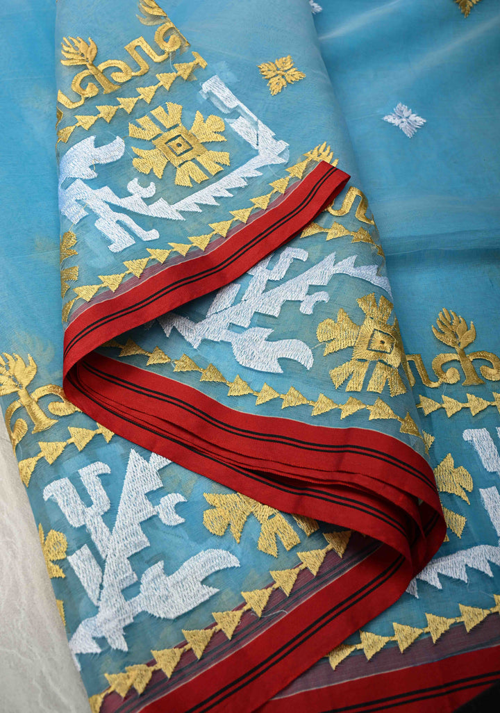 Sky Blue Mercedized Bengal cotton machine embroidered Butta and Border and long tassels
