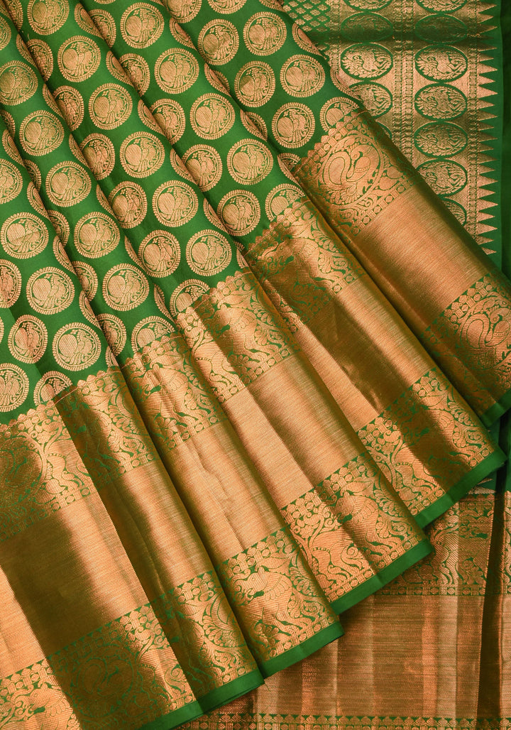 Exquisite Celebrity Grand Brocade Kanjivaram Pure Silk Saree in Leaf Green with Intricate Pallu and Zari  | SILK MARK CERTIFIED