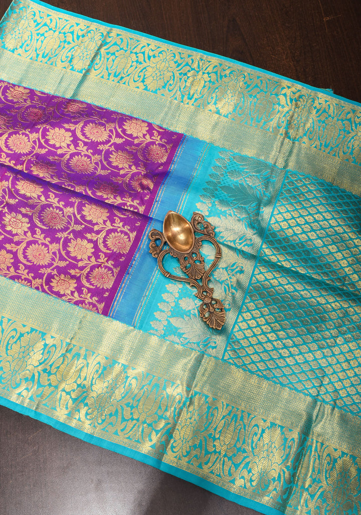 Purple Exquisite Kanjivaram Pure Silk saree with Floral Zari Brocade and Blue Contrast Borders | SILK MARK CERTIFIED