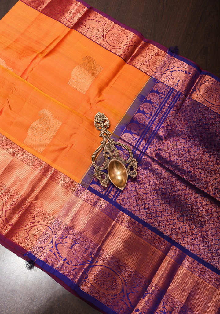 Orange kanjivaram silk saree with damask buttas and contrast border | SILK MARK CERTIFIED
