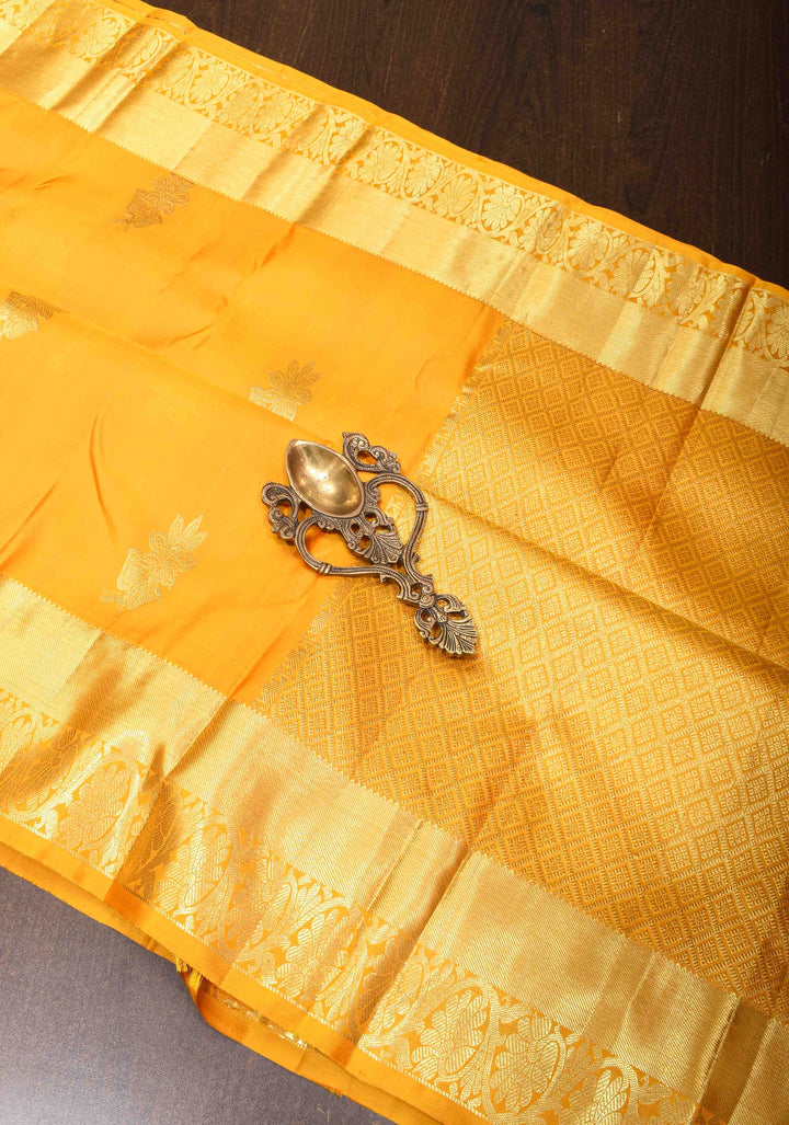 Vibrant Yellow Kanjivaram Silk Saree with Floral Motifs and Zari Border| SILK MARK CERTIFIED