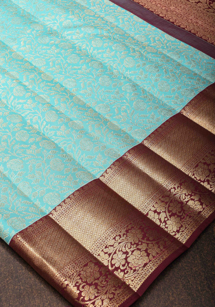 Aqua Blue Kanjivaram Silk Saree with Floral Brocade and Contrast Zari Boder | SILK MARK CERTIFIED