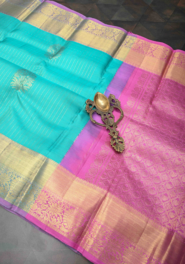 Cyan Vertical Stripes Kanjivaram Pure Silk Saree With Zari Buttas And Zari Border | SILK MARK CERTIFIED