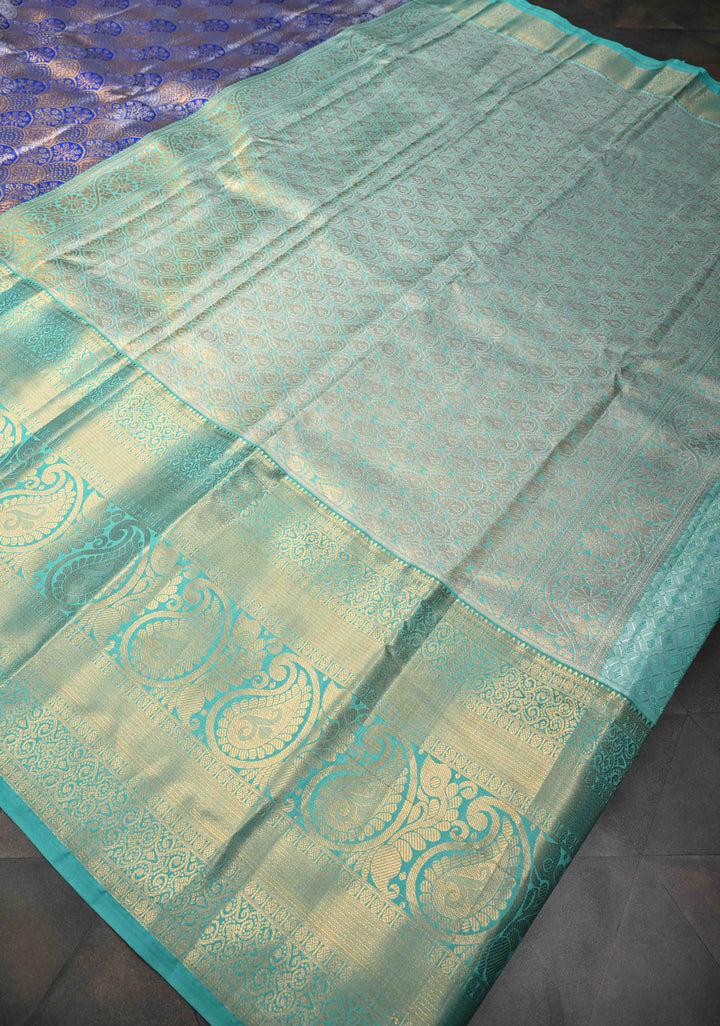 Blue Tissue Semi Silk Saree in Kanchi Style with Floral Scallop Brocade and Wide Contrast Zari Border