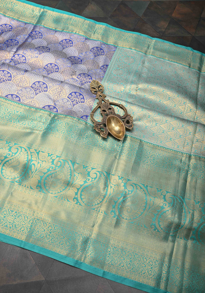 Blue Tissue Semi Silk Saree in Kanchi Style with Floral Scallop Brocade and Wide Contrast Zari Border