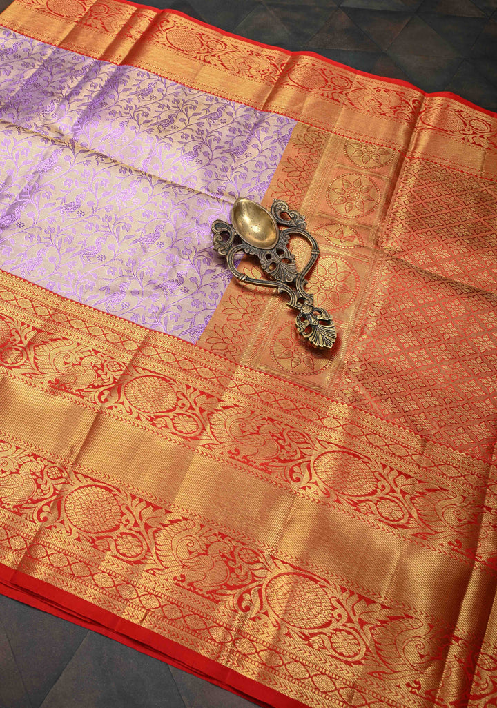 Lavender Tissue Semi Silk Saree in Kanchi Style with Peacock Brocade Jaal and Contrast Zari Border