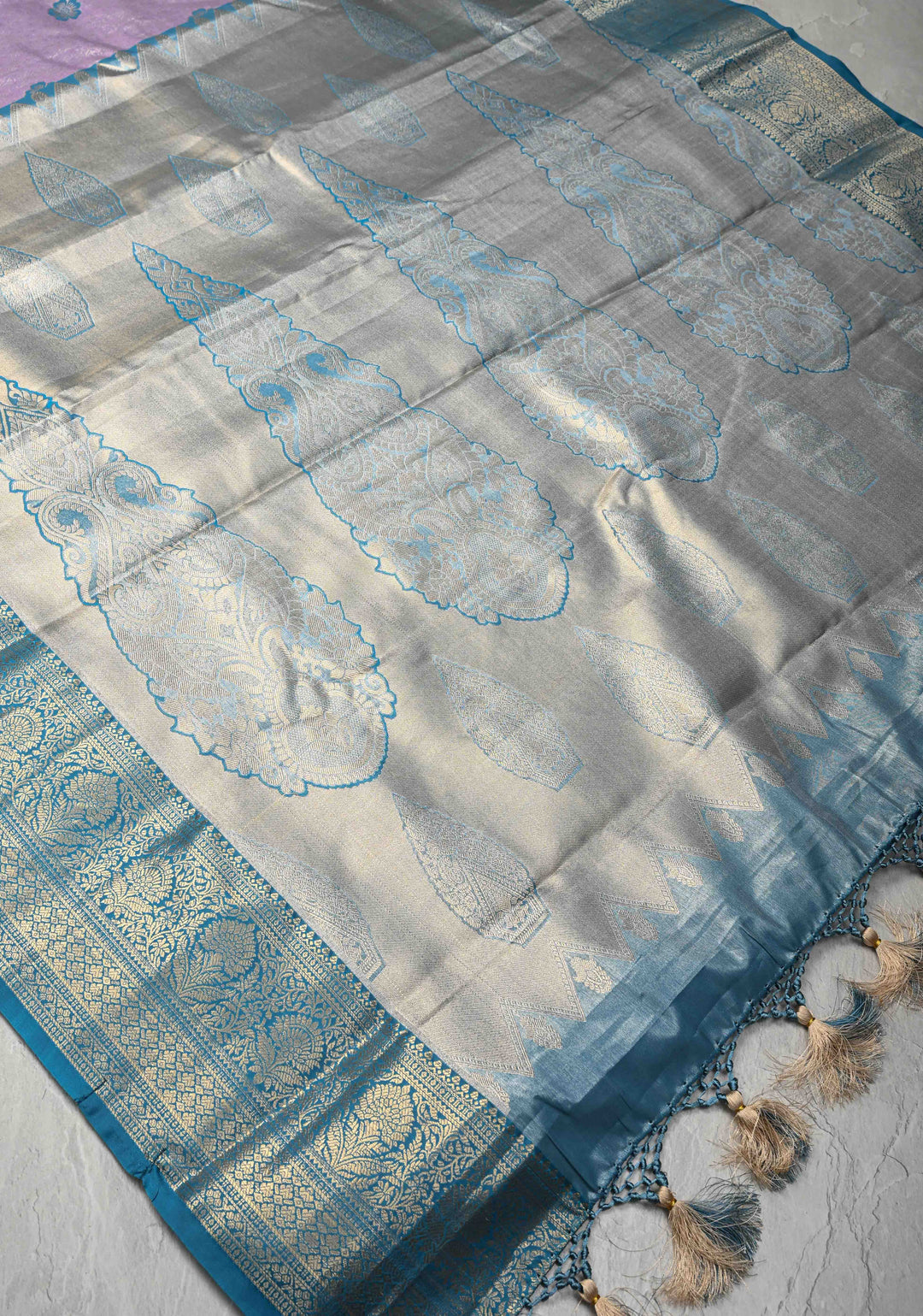 Pastel Purple Brocade Jaal on Kanjivaram Tissue Semi Silk Saree with Meenakari Buttas and Contrast Zari Border