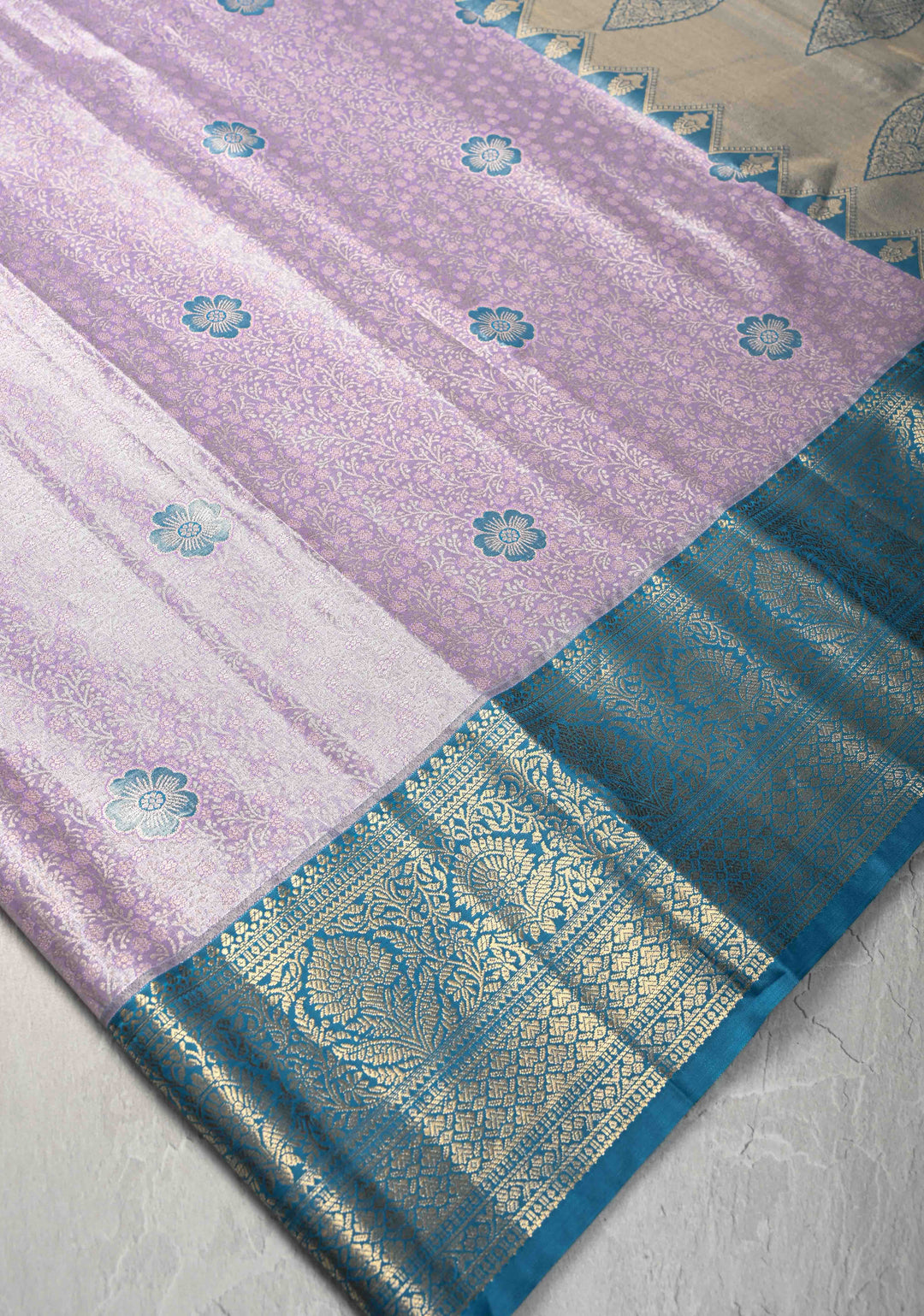 Pastel Purple Brocade Jaal on Kanjivaram Tissue Semi Silk Saree with Meenakari Buttas and Contrast Zari Border