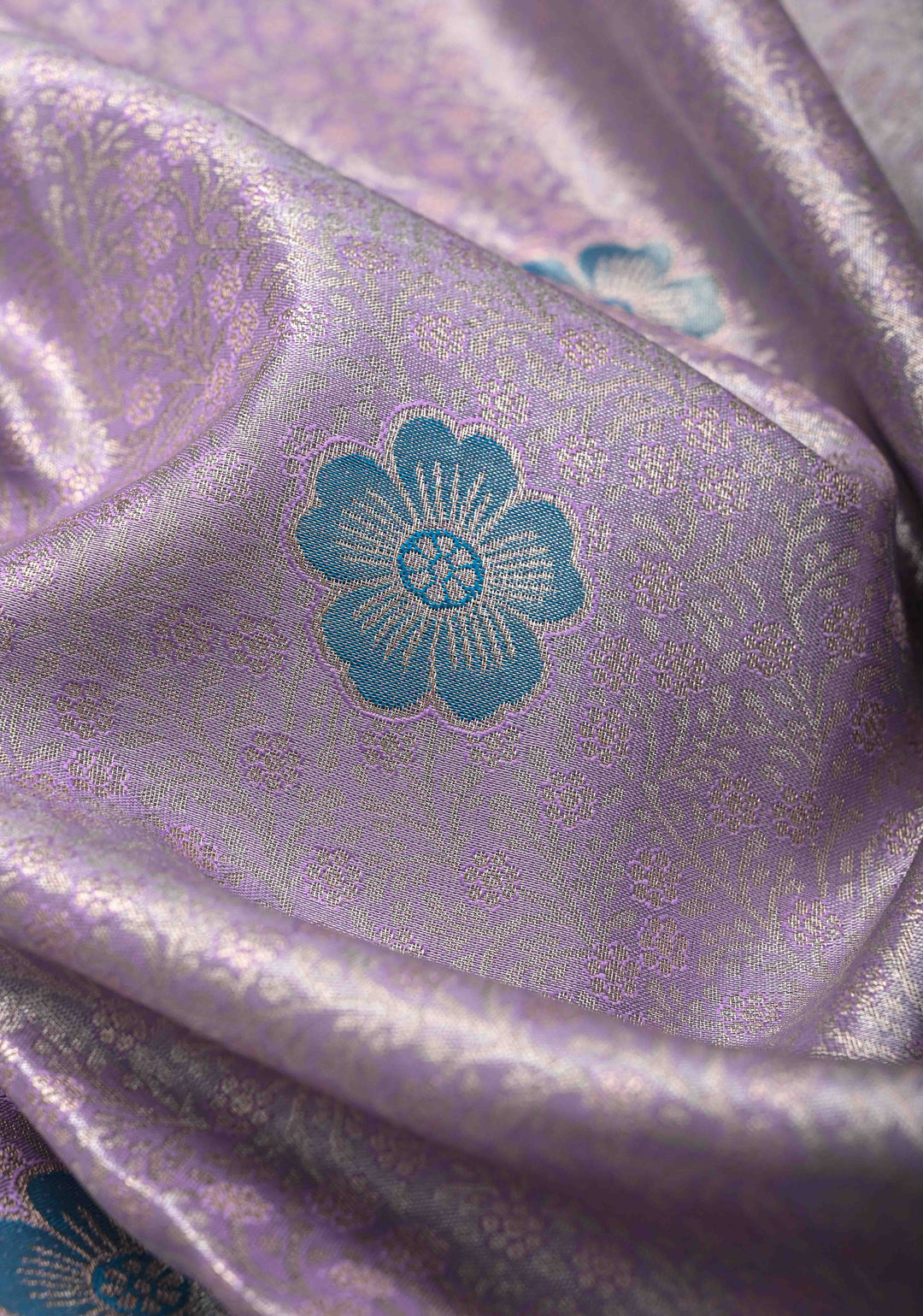 Pastel Purple Brocade Jaal on Kanjivaram Tissue Semi Silk Saree with Meenakari Buttas and Contrast Zari Border