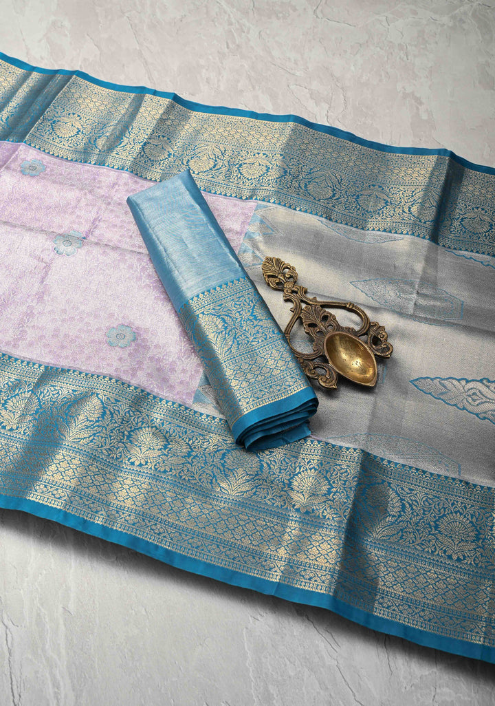 Pastel Purple Brocade Jaal on Kanjivaram Tissue Semi Silk Saree with Meenakari Buttas and Contrast Zari Border