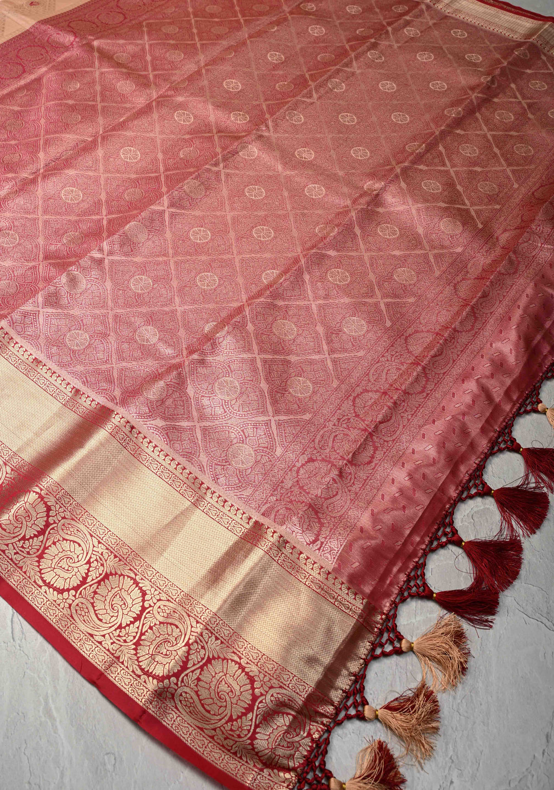 Peach Brocade Jaal on Kanjivaram Tissue Semi Silk Saree with Meenakari Buttas and Contrast Zari Border