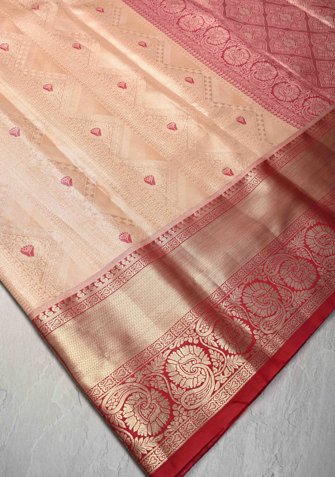 Peach Brocade Jaal on Kanjivaram Tissue Semi Silk Saree with Meenakari Buttas and Contrast Zari Border