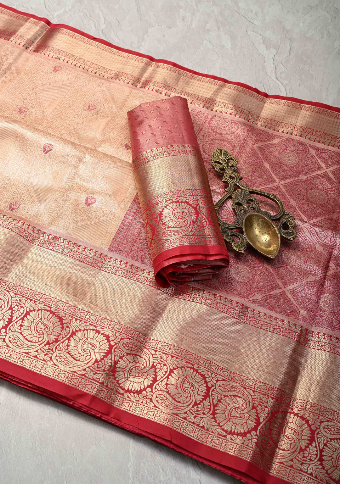 Peach Brocade Jaal on Kanjivaram Tissue Semi Silk Saree with Meenakari Buttas and Contrast Zari Border