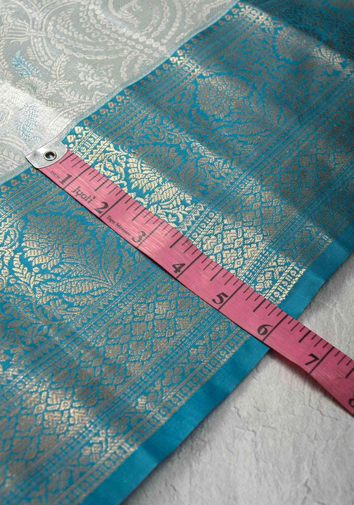 Dusty Sage Green Brocade on Kanjivaram Tissue Semi Silk Saree with Meenakari Buttas and Contrast Zari Border