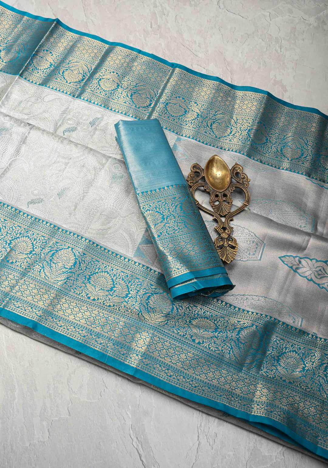 Dusty Sage Green Brocade on Kanjivaram Tissue Semi Silk Saree with Meenakari Buttas and Contrast Zari Border